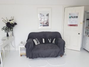 Grey sofa in the salon our original pedicure station